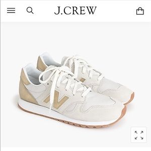 Good condition J Crew gold and white sneakers. J Crew collab. Size 9. So cute!